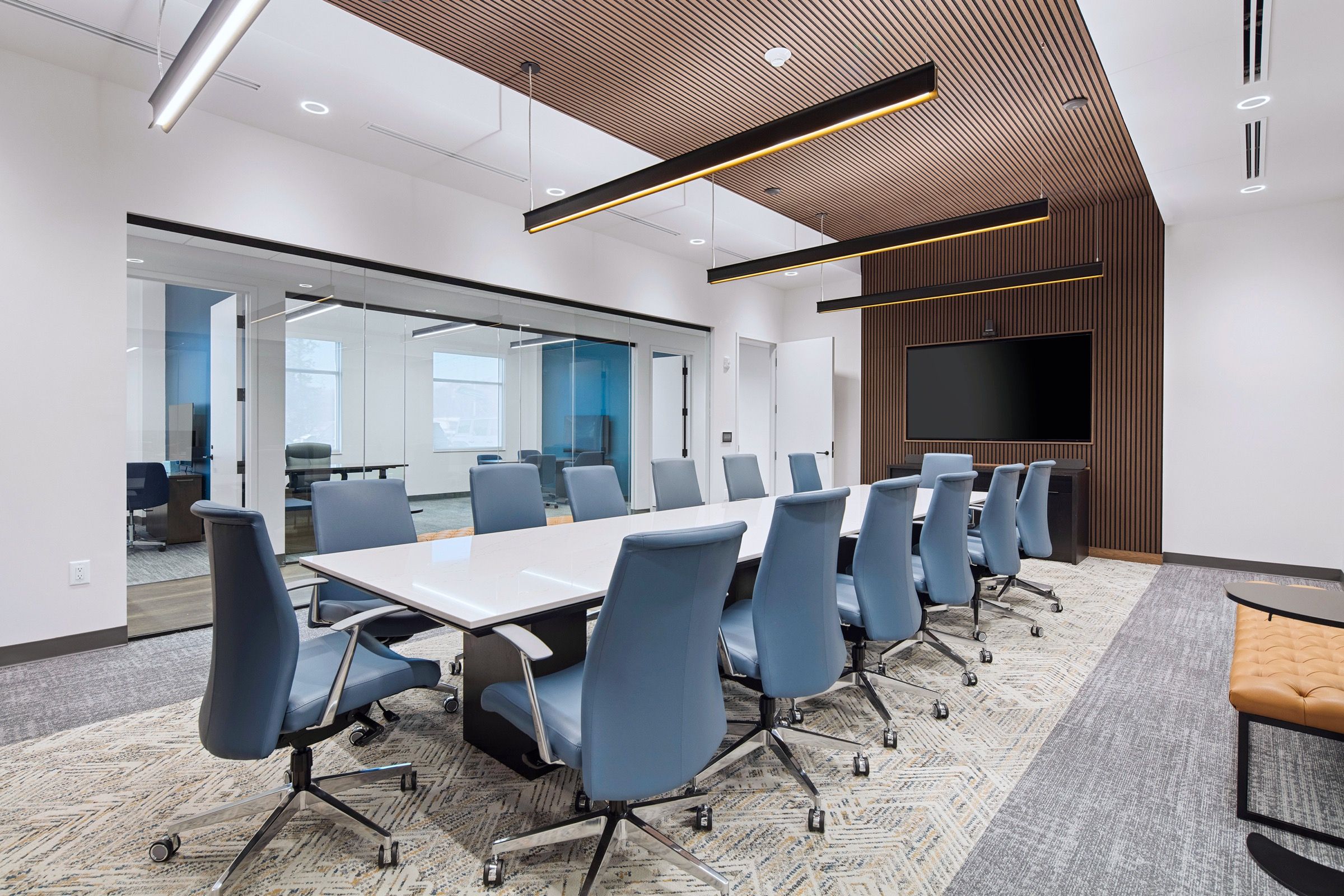 The boardroom at the Whitehead Electric office, long conference table under a wood slat ceiling