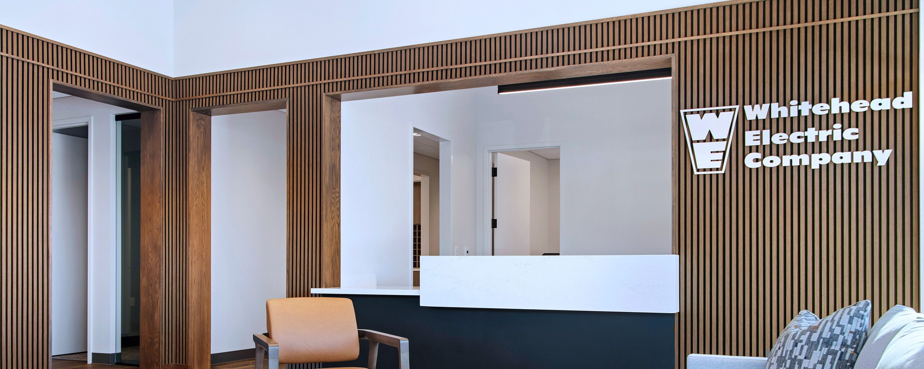 Reception wall at the Whitehead Electric office